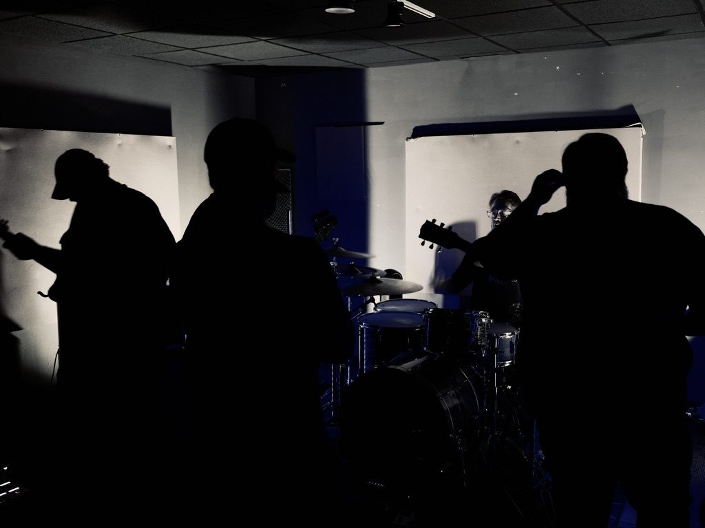 The Temptation Of Saint Anthony rehearsing — band silhouettes