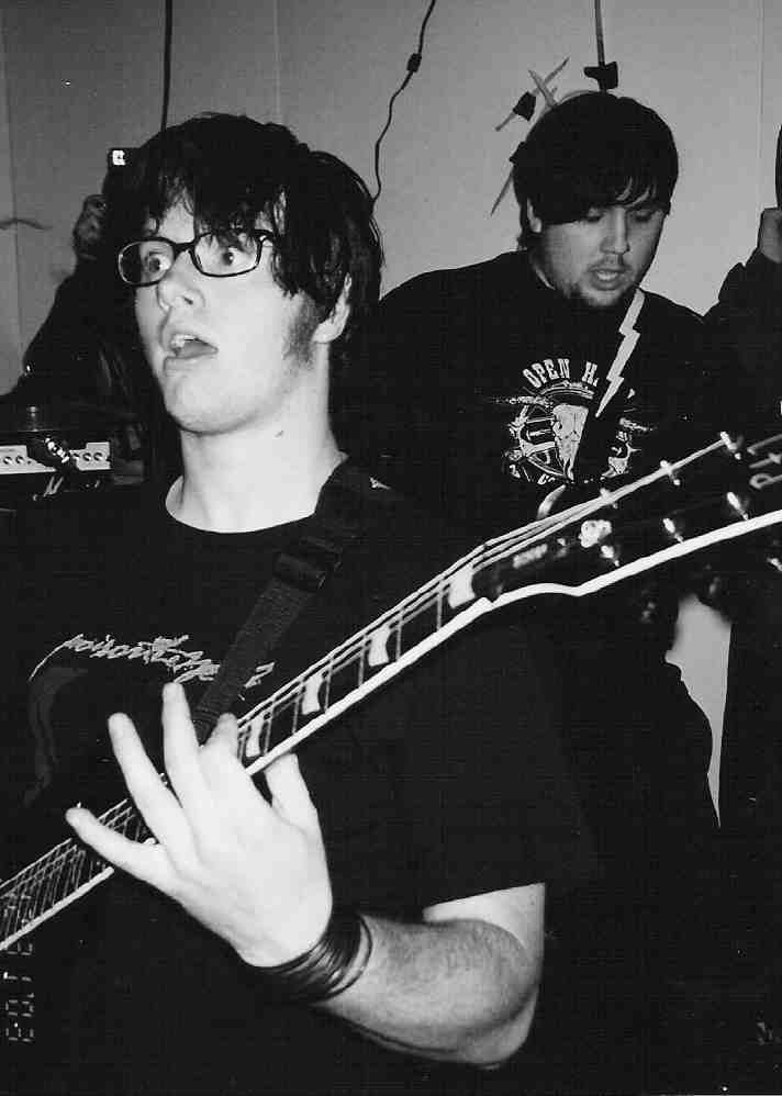The TOSA live — two guitarists performing