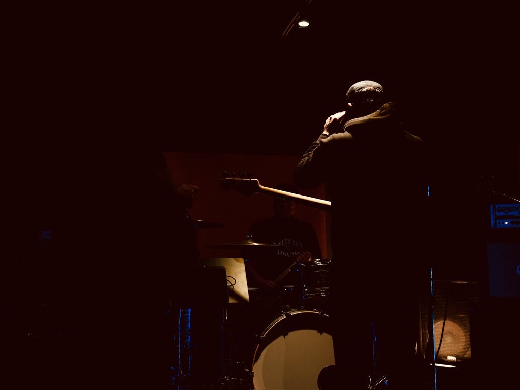 The TOSA performing live on stage